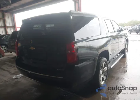 2018 Chevrolet Suburban Premier z USA, uszkodzony, nr VIN 1GNSCJKC8JR125331